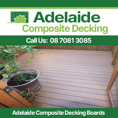 Adelaide composite decking boards with natural timber look finish beside garden planter
